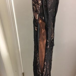 Beautiful black cocktail lace dress, form fitting